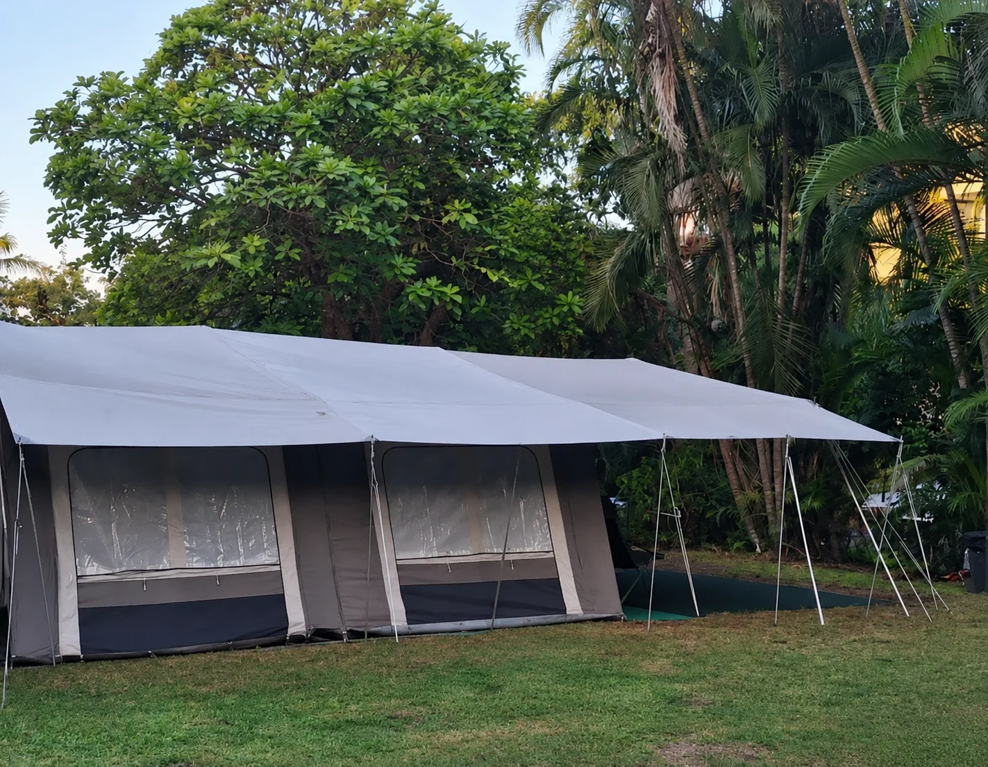 Close-up of tent fabric being patched with precision tools